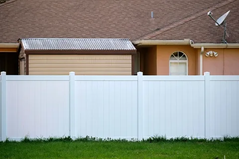 White plastic fence for backyard 